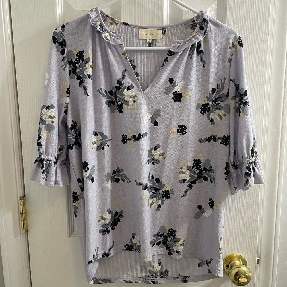 Purple floral blouse